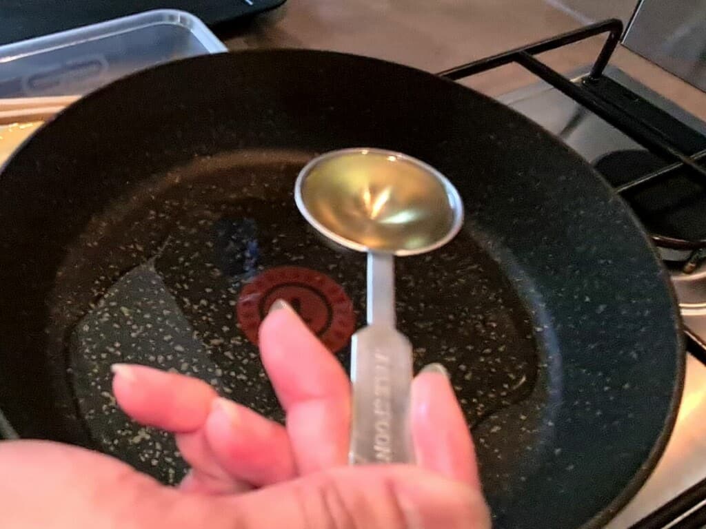 Add oil to pan